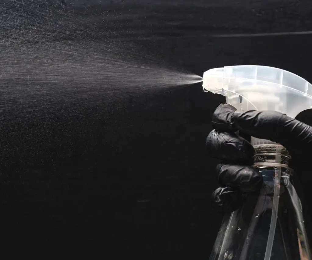 A picture of a spray bottle containing a homemade AC Coiler cleaner  of bleach and water
