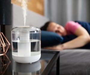 image of person sleeping in a room that has been sized for a humidifier properly